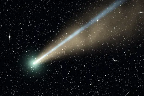 Artistic rendering of a comet with a curved golden dust tail and a straight blue ion tail
