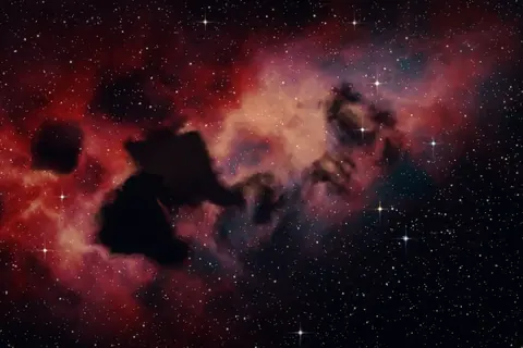Artistic rendering of a red emission nebula with dark dust clouds and scattered stars